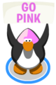 A penguin doing the wave action with the Pink Face Paint on causing it to hold up a sign that says GO PINK.