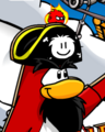 The Black Puffle on top of the Mechanical Rockhopper Sign at the Ski Village.