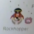 A bit of a blurry image of Rockhopper in The Migrator Mascot Costume