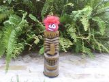 A red puffle on a totem pole.