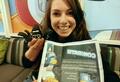 Bobbi with some fan arts at Club Penguin office.