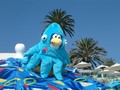 Squidzoid on an umbrella at the beach.