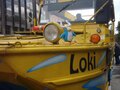 A viking penguin on a boat.