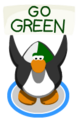 A penguin doing the wave action with the Green Face Paint on causing it to hold up a sign that says GO GREEN.