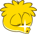 A Gold Puffle sleeping.