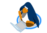 A penguin using the Laptop.